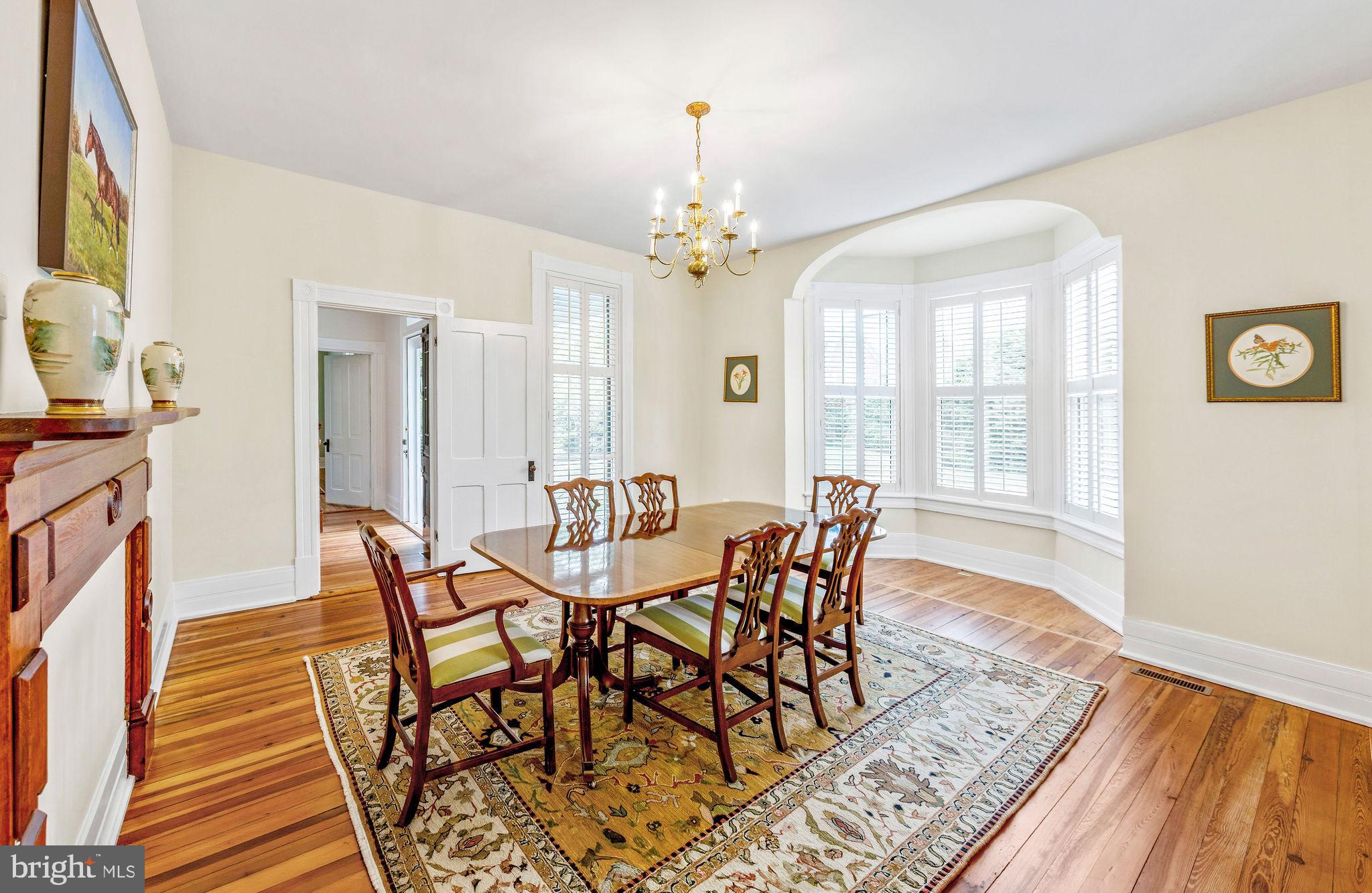 558 Gay Street Washington, VA 22747 - Photo 12 of 52 a view of a dining room with furniture window and wooden floor