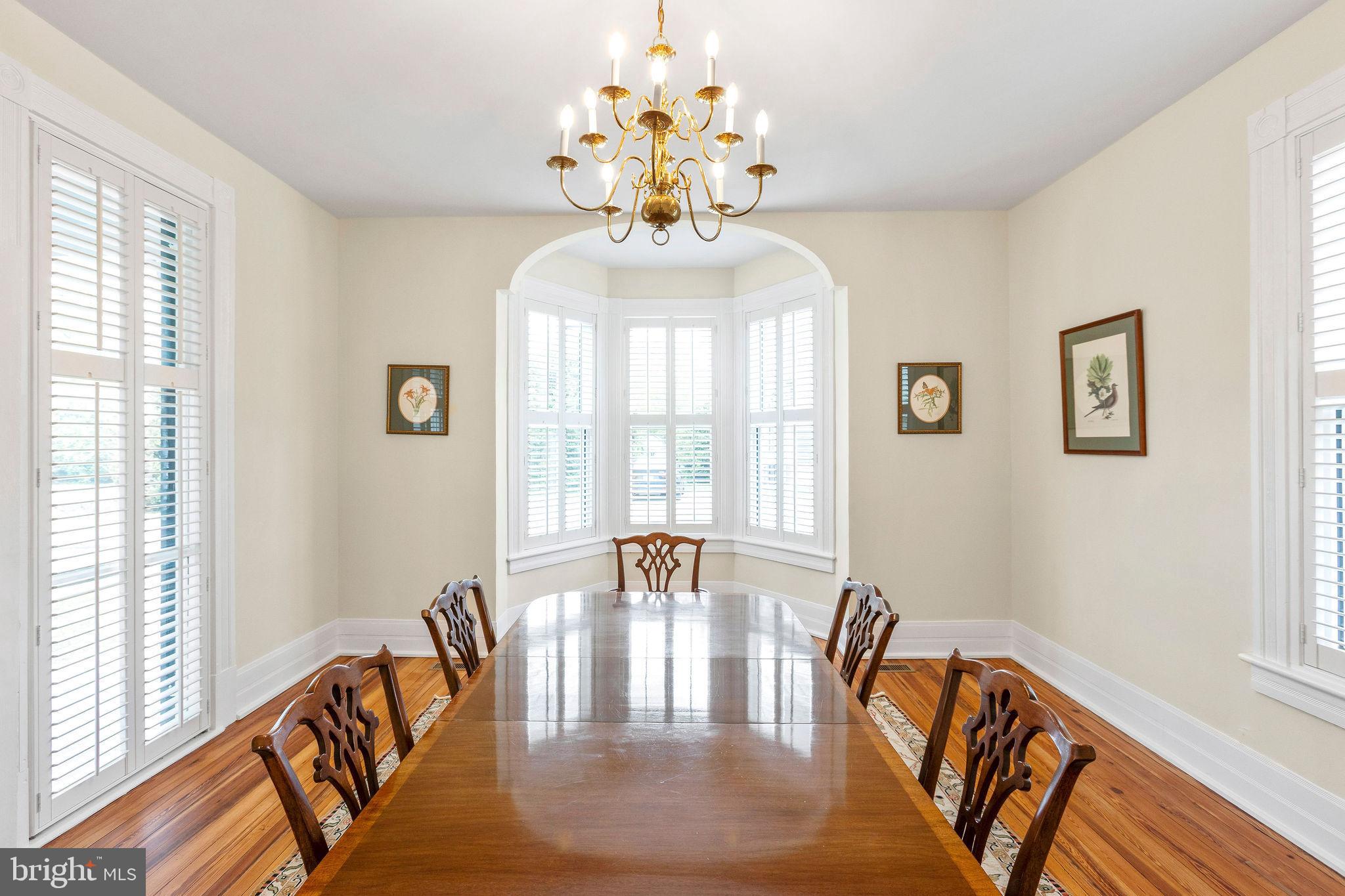 558 Gay Street Washington, VA 22747 - Photo 13 of 52 a view of a dining room with furniture window and wooden floor
