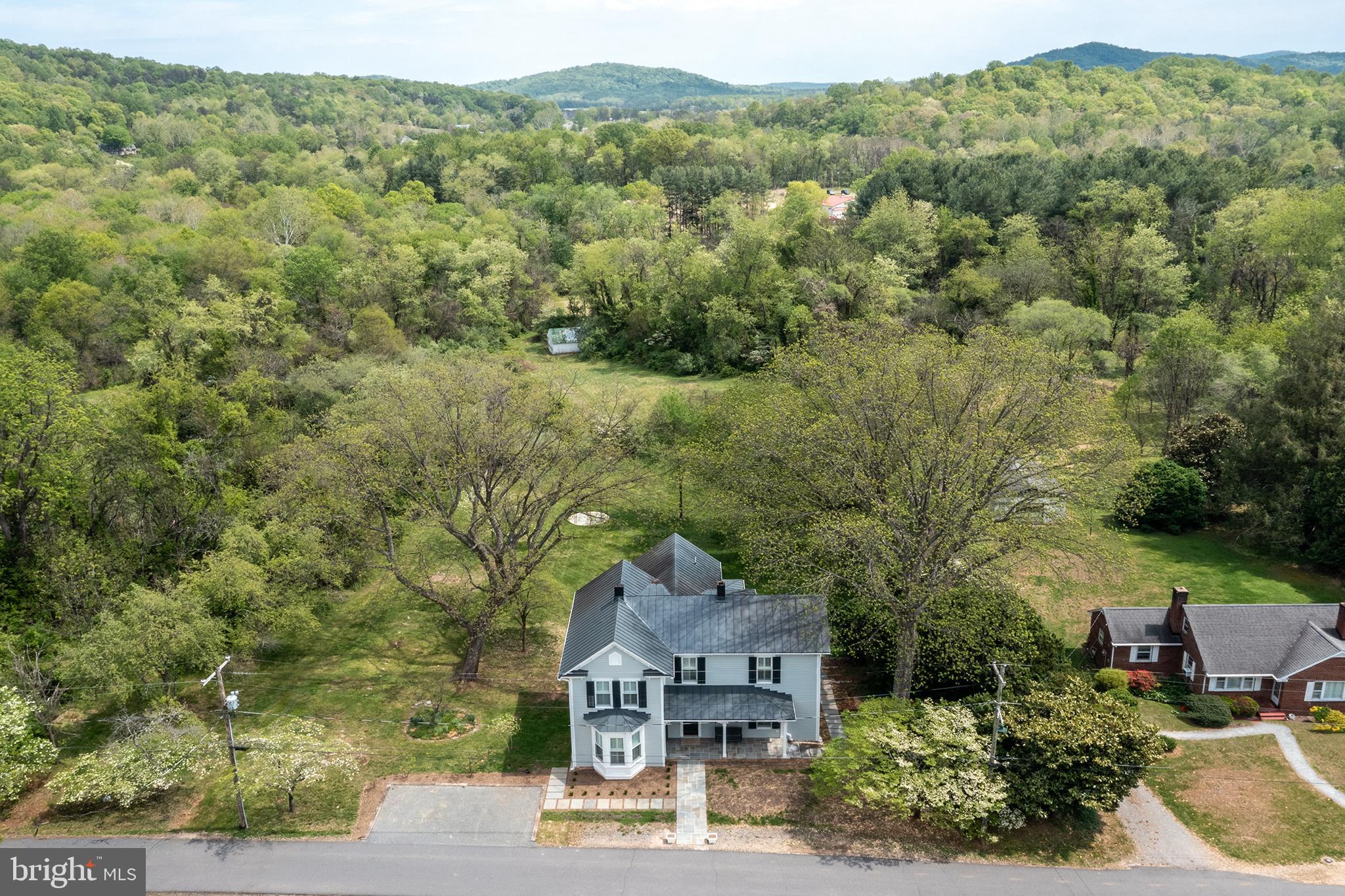 558 Gay Street Washington, VA 22747 - Photo 4 of 52 an aerial view of a house with a yard