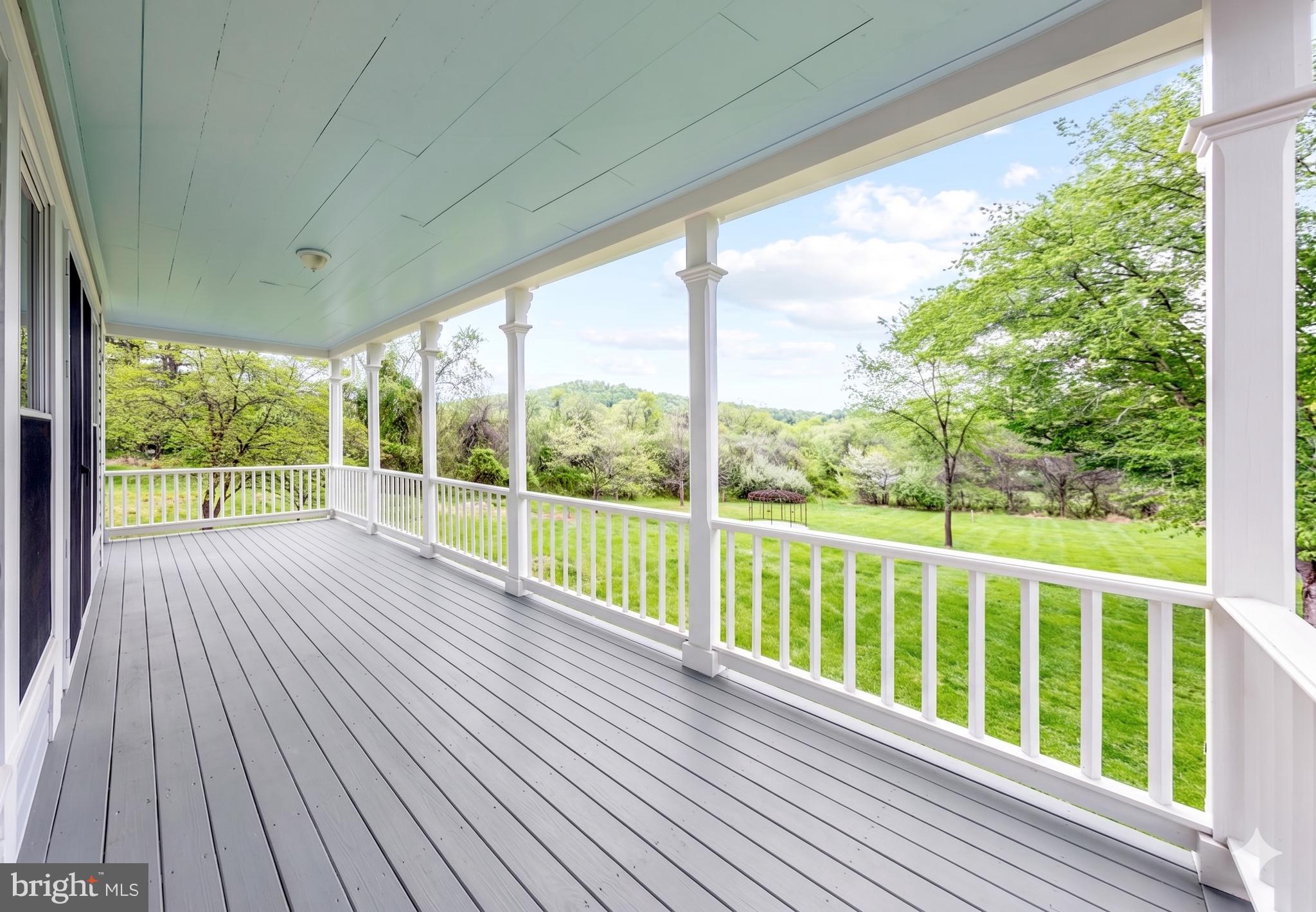 558 Gay Street Washington, VA 22747 - Photo 40 of 52 a view of a balcony with wooden floor