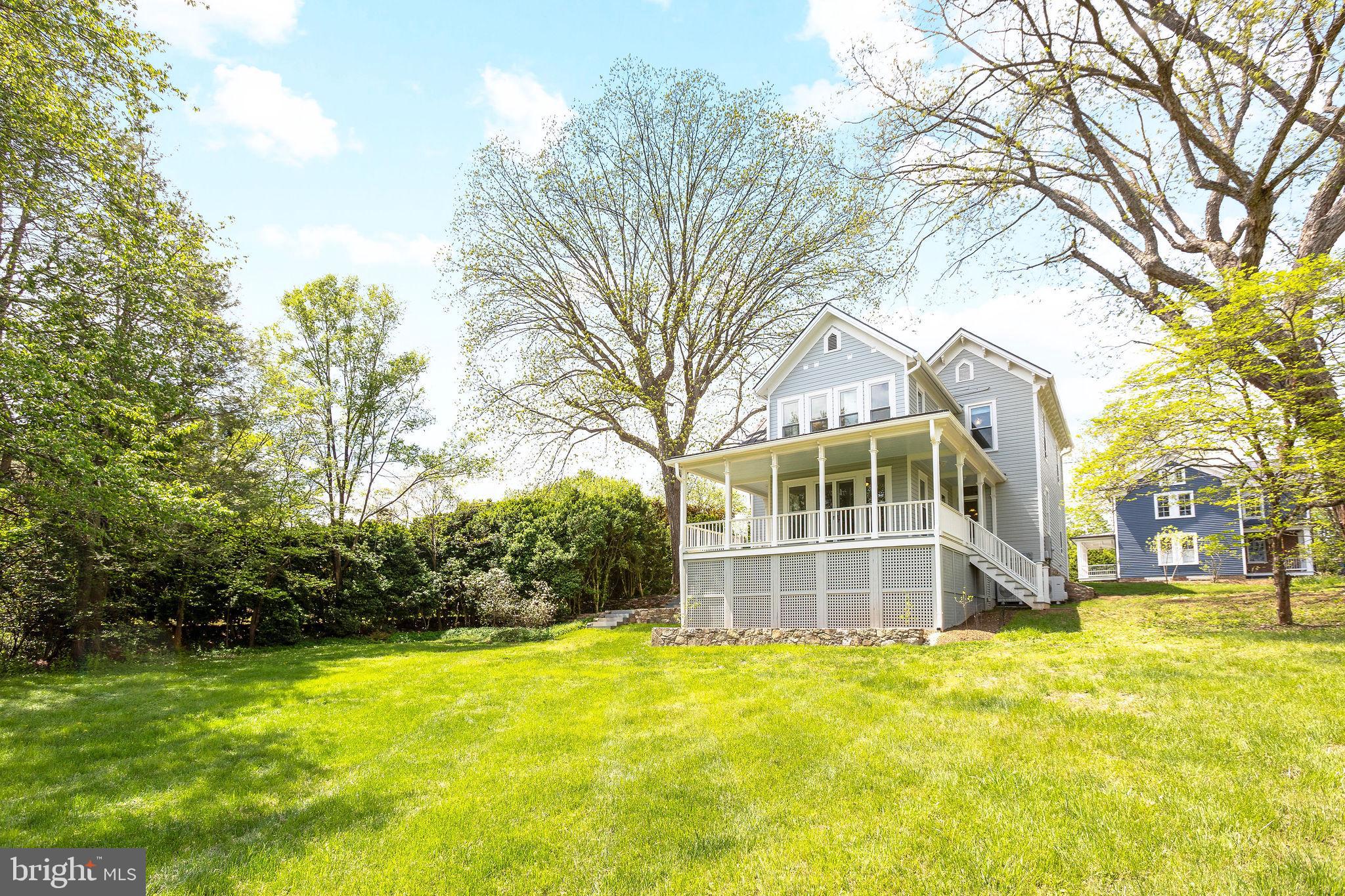 558 Gay Street Washington, VA 22747 - Photo 43 of 52 a front view of a house with a yard and trees