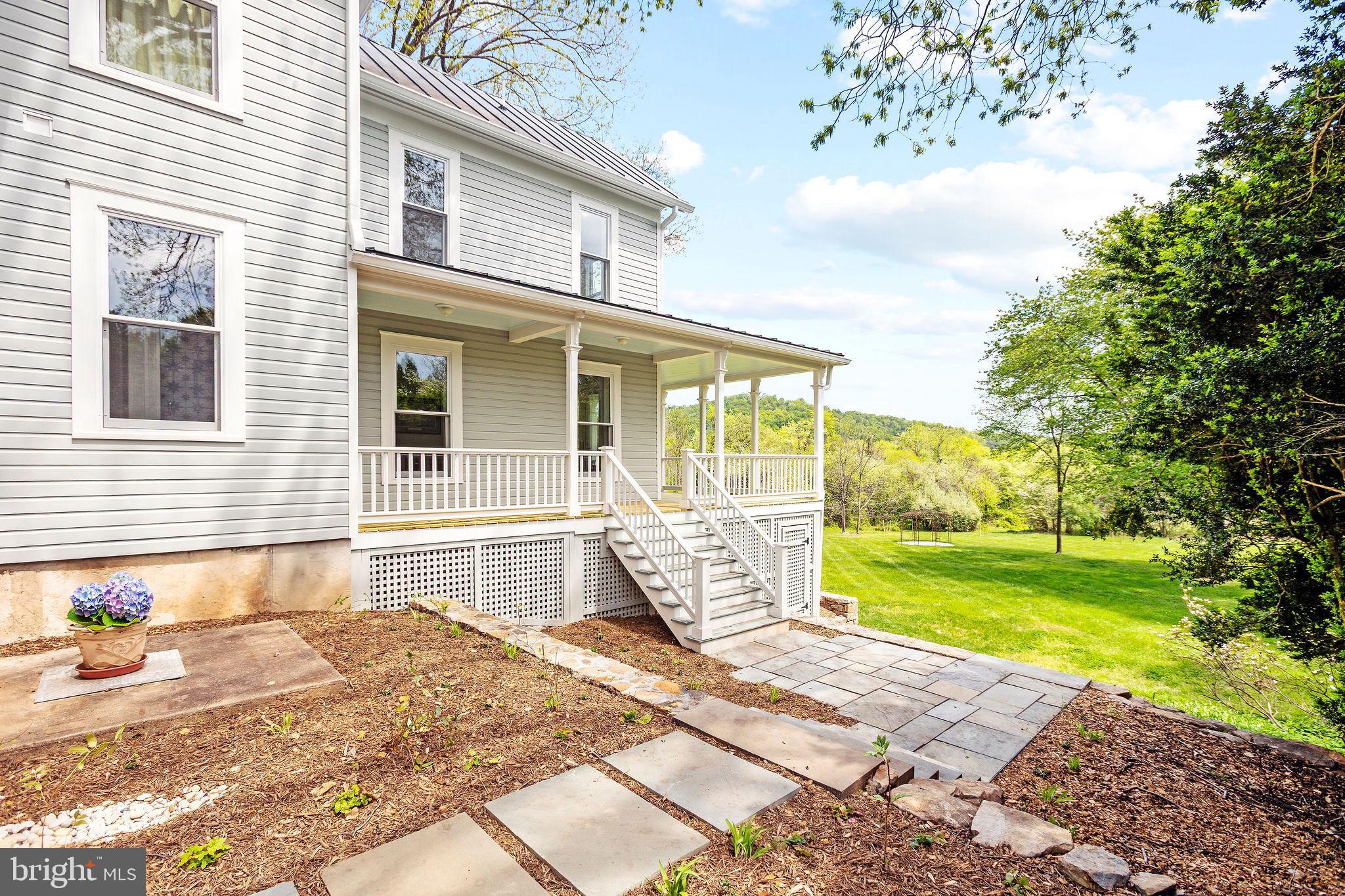 558 Gay Street Washington, VA 22747 - Photo 45 of 52 a front view of a house with a yard