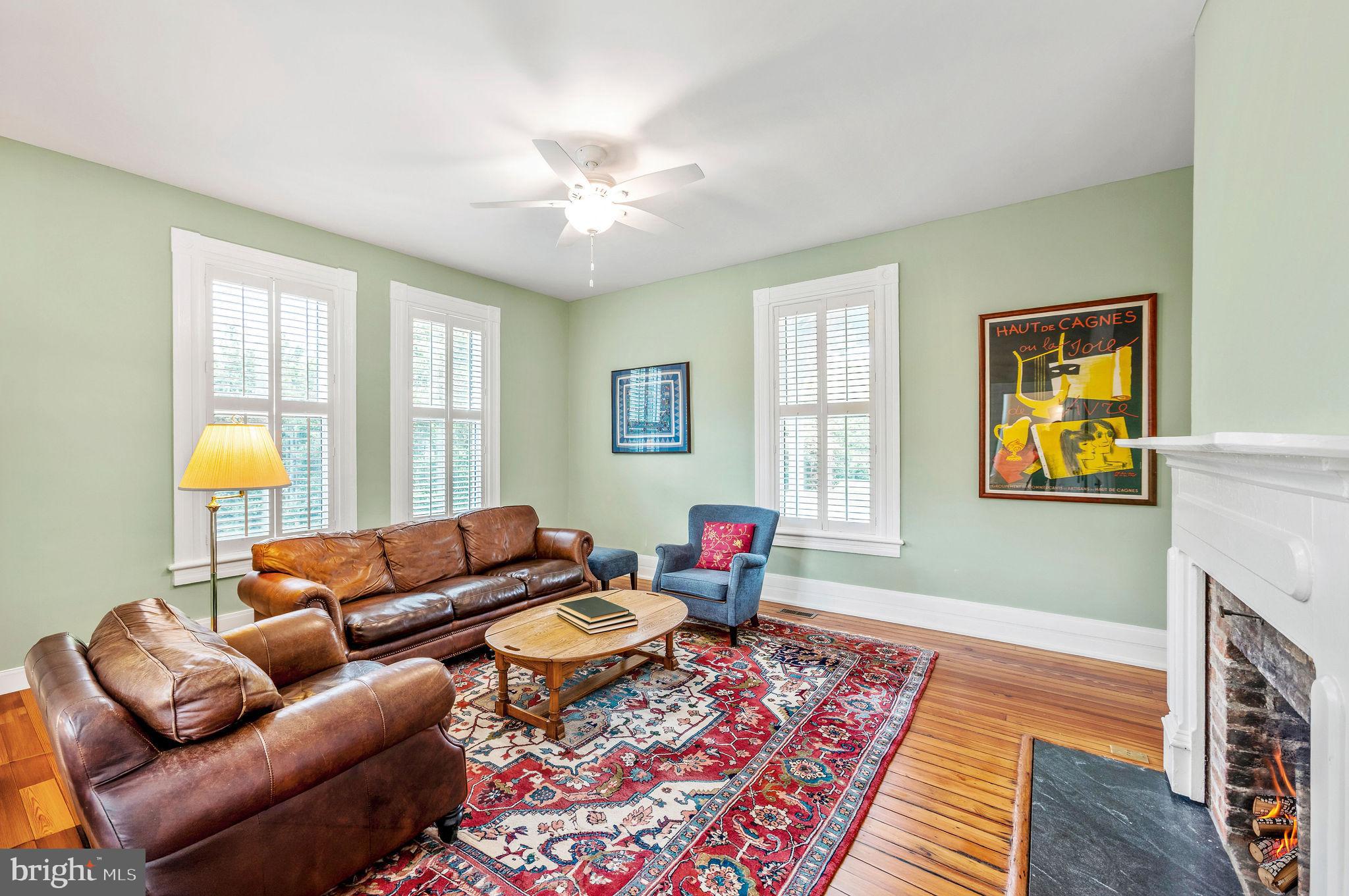 558 Gay Street Washington, VA 22747 - Photo 9 of 52 a living room with furniture and a fireplace