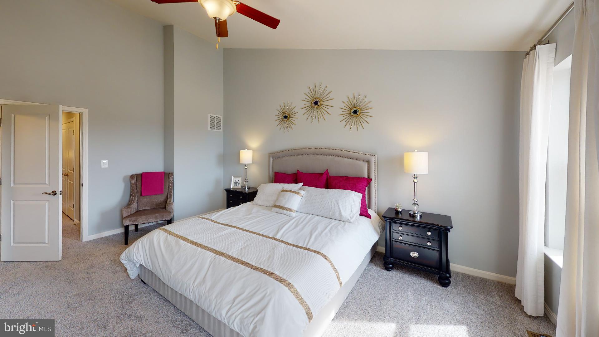 321 Purple Place Edgewood, MD 21040 - Photo 38 of 46 a bedroom with a bed and a chandelier