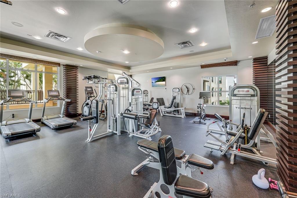 9123 Strada Place, Unit 7201 Naples, FL 34108 - Photo 27 of 50 a view of a room with gym equipment