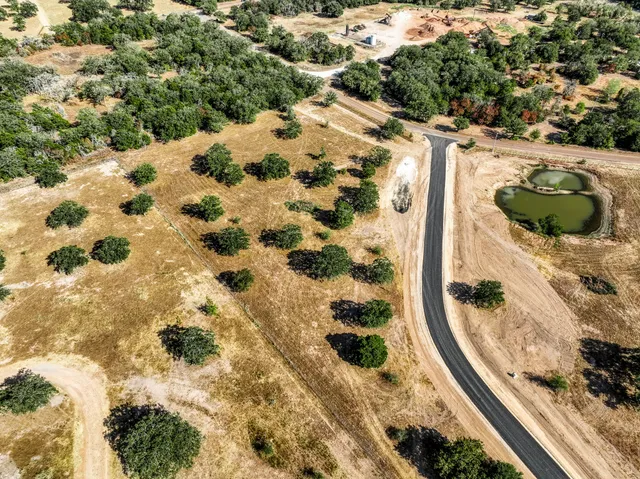 a view of a balcony with wooden floor