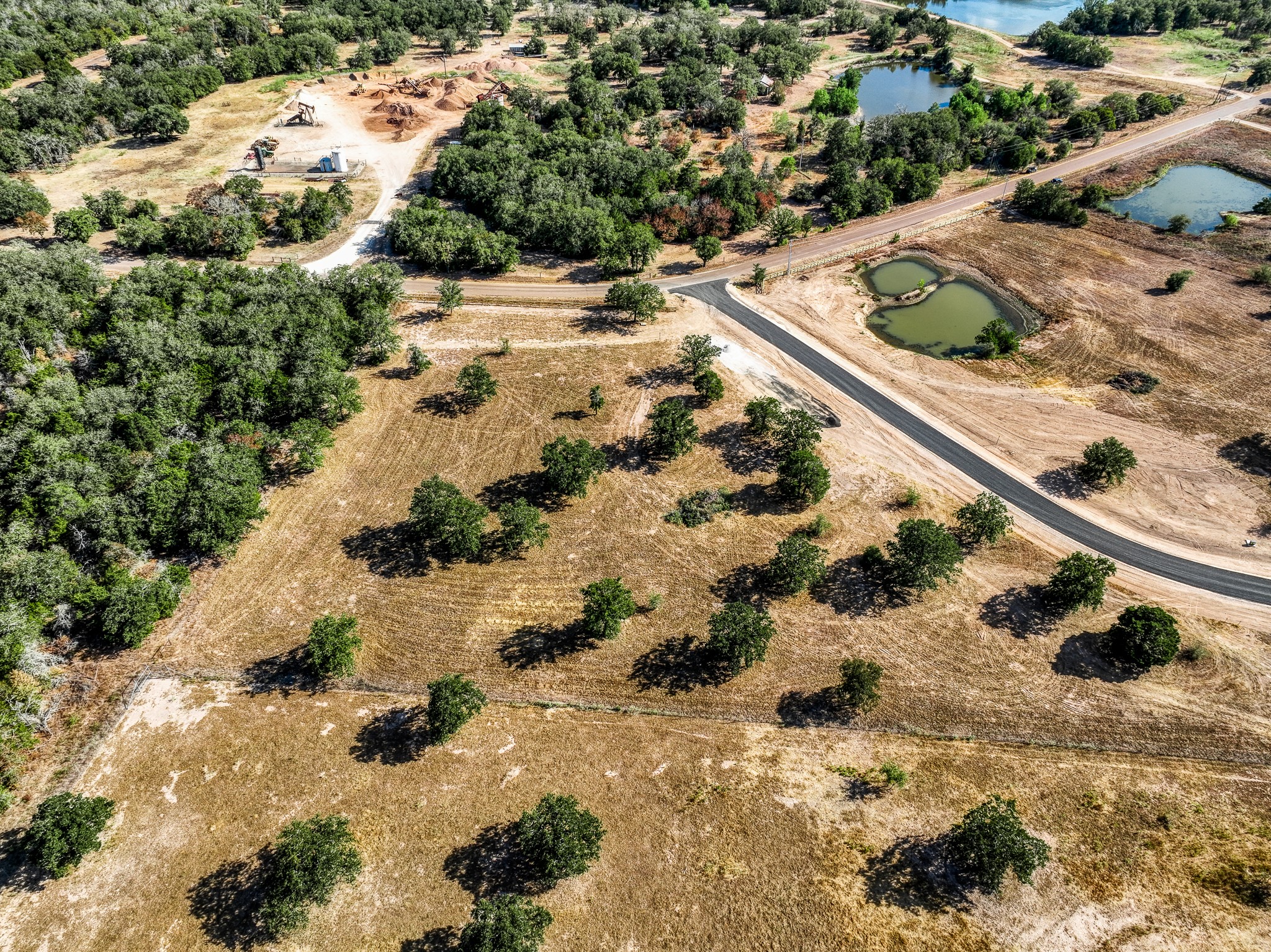 120 Feder Way Point West Point, TX 78963 - Photo 5 of 9 a view of a yard with wooden fence