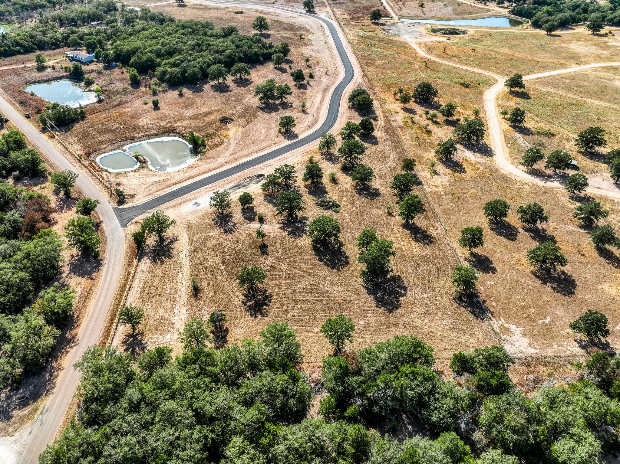 120 Feder Way Point West Point, TX 78963 - Photo 8 of 9 an aerial view of a house with a yard