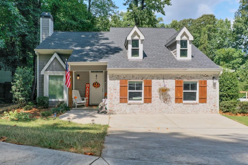 3003 Mulberry Street Marietta, GA 30066 - Photo 1 of 1 front view of a house with a yard