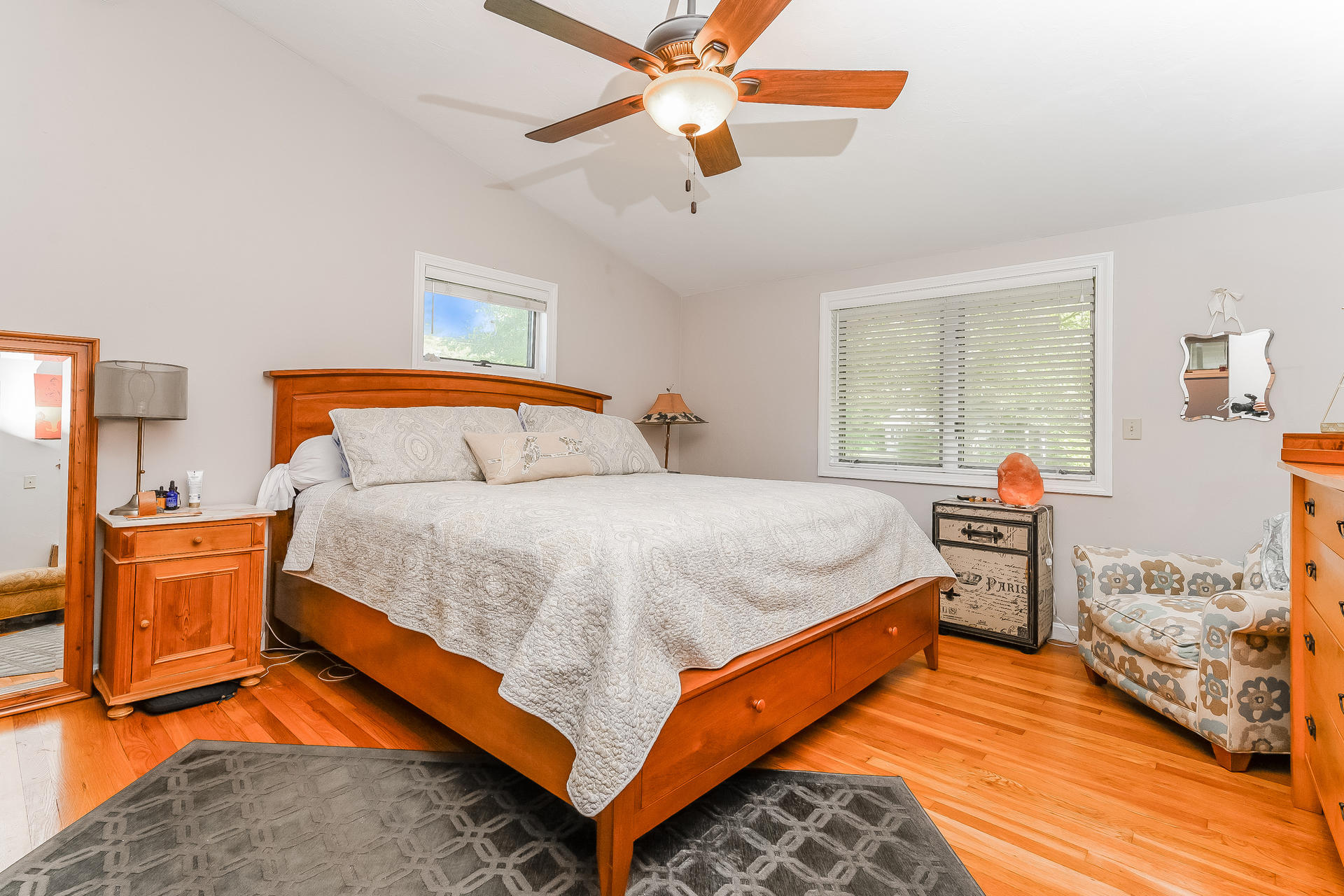 54 Pine Tree Drive Centerville, MA 02632 - Photo 11 of 16 a bedroom with a bed and dresser with wooden floor