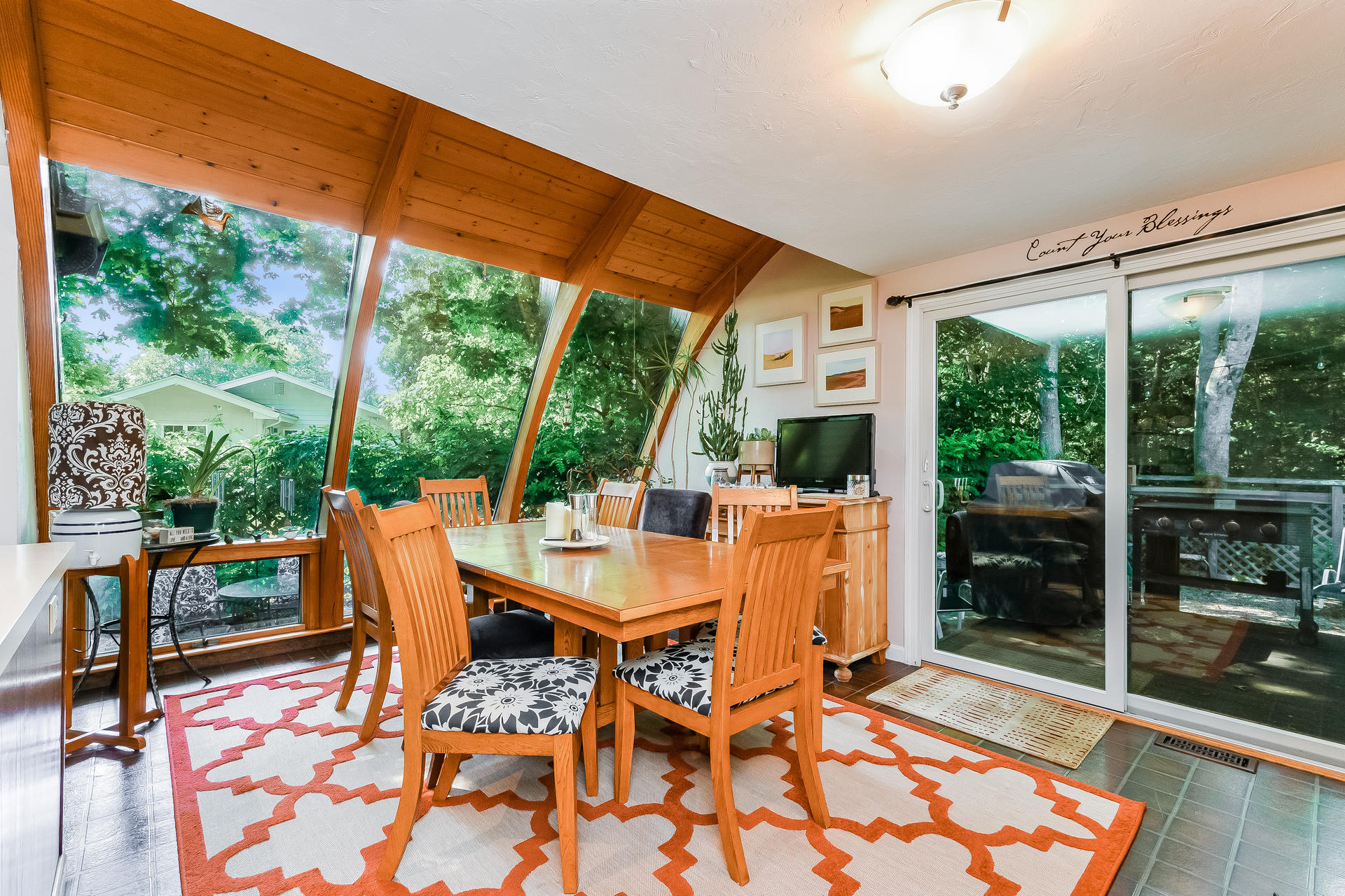 54 Pine Tree Drive Centerville, MA 02632 - Photo 5 of 16 a outdoor space with patio the couches and a dining table with garden view