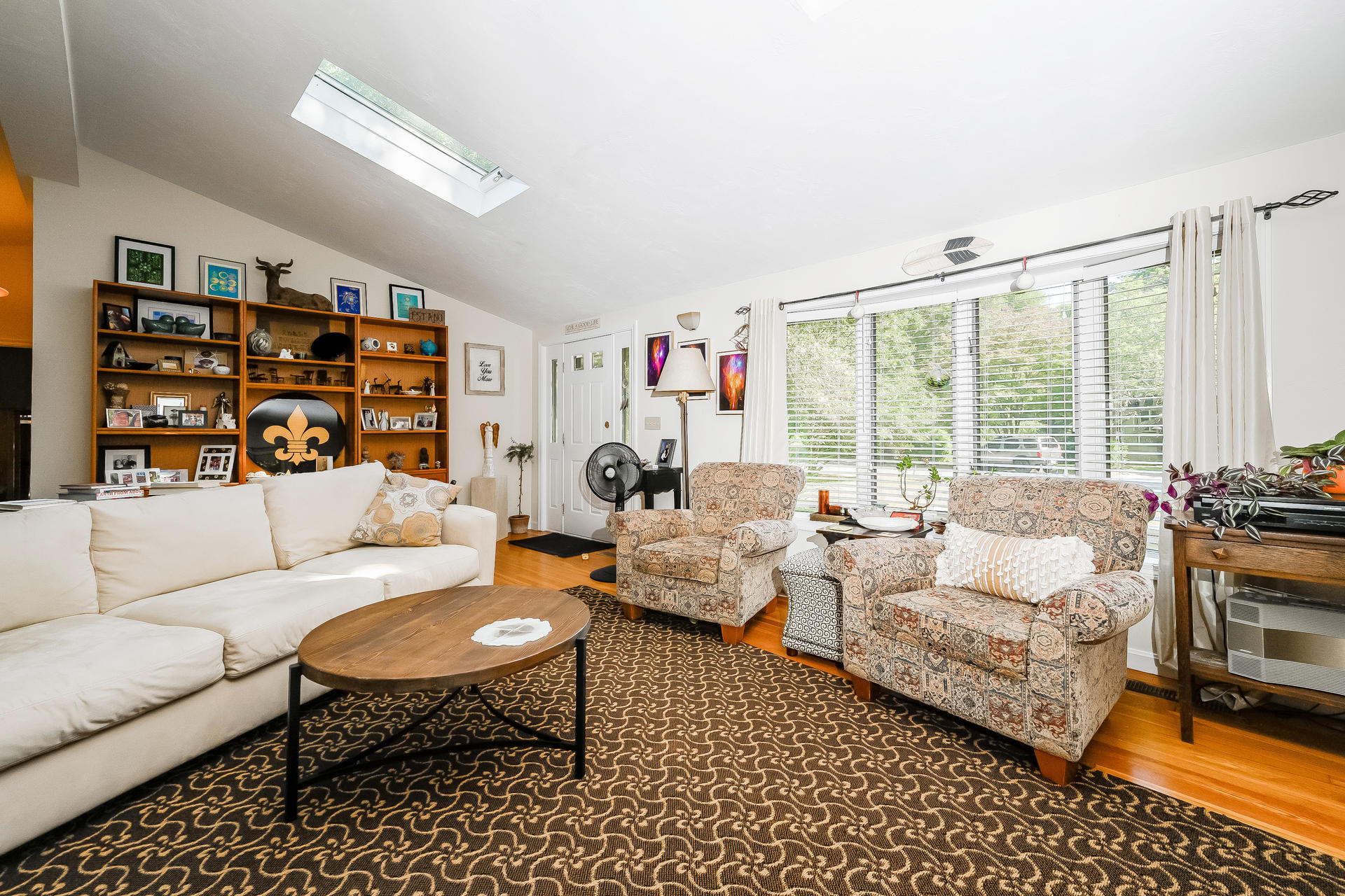 54 Pine Tree Drive Centerville, MA 02632 - Photo 10 of 16 a living room with furniture and a large window