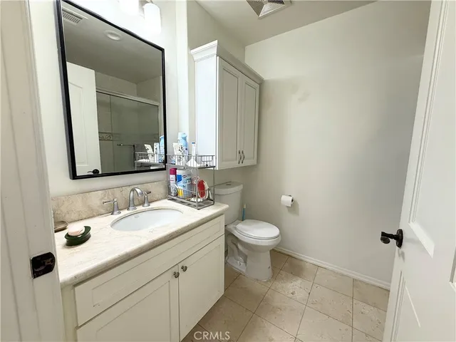 a bathroom with a sink and a toilet