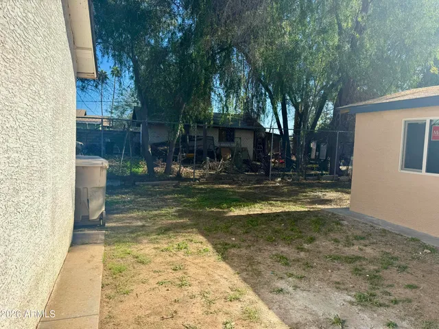 a view of swimming pool with patio