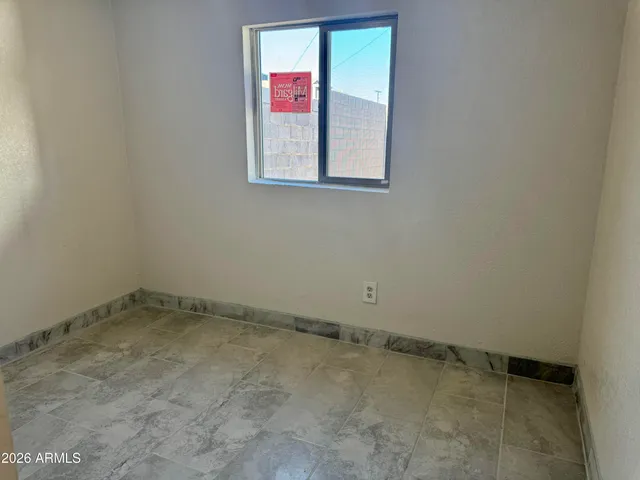 an empty room with a window