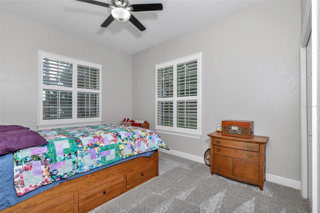 1989 Northwest 111th Loop Ocala, FL 34475 - Photo 30 of 55 a bed room with a bed and a window