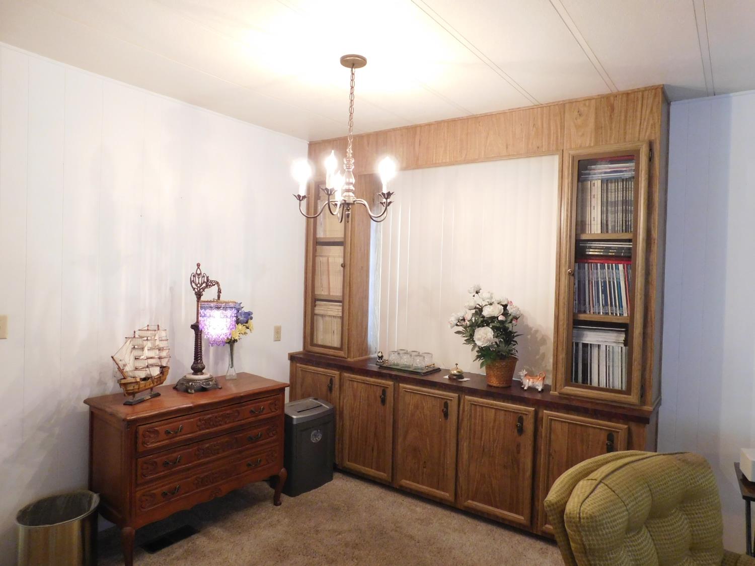 43 Rio Vista Drive Lodi, CA 95240 - Photo 15 of 27 a room with furniture and chandelier