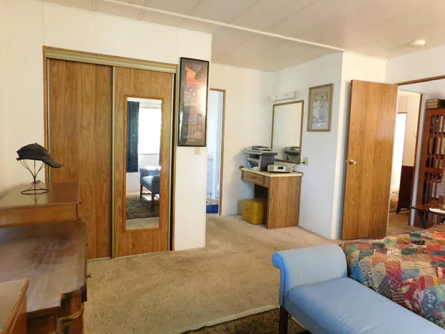 a kitchen with stainless steel appliances granite countertop a refrigerator and a stove
