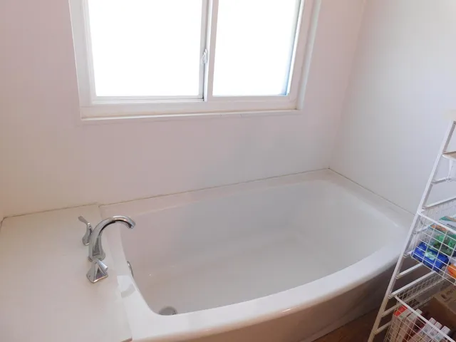 a bathroom with a bathtub