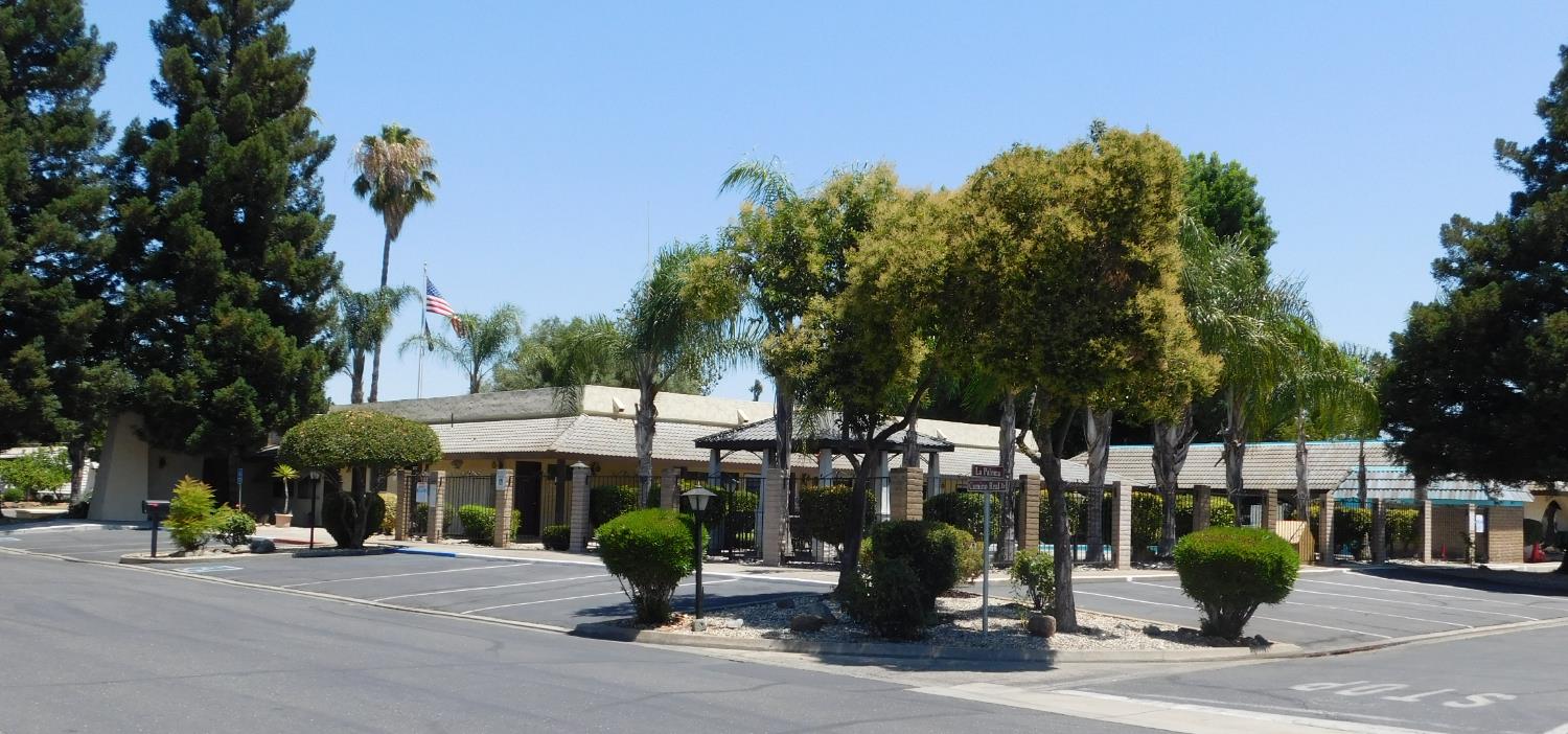 43 Rio Vista Drive Lodi, CA 95240 - Photo 26 of 27 a front view of a building with tree s