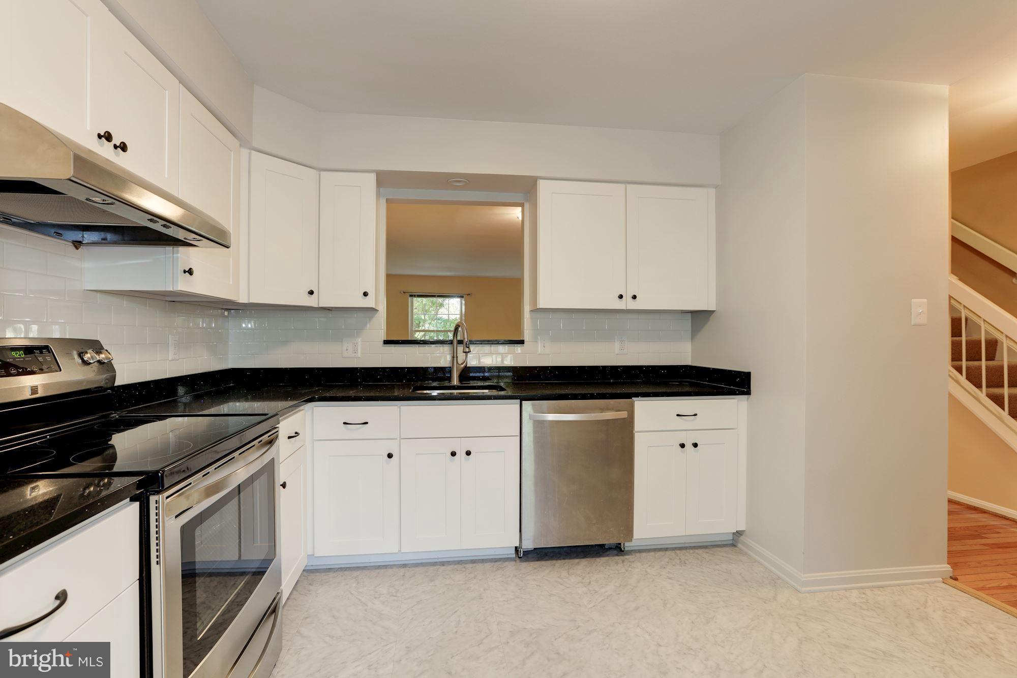 1918 Flowering Tree Terrace Silver Spring, MD 20902 - Photo 8 of 23 Kitchen