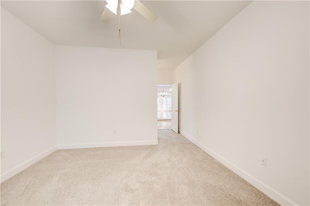 2865 Lenox Road Northeast, Unit 102 Atlanta, GA 30324 - Photo 22 of 35 a view of an empty room