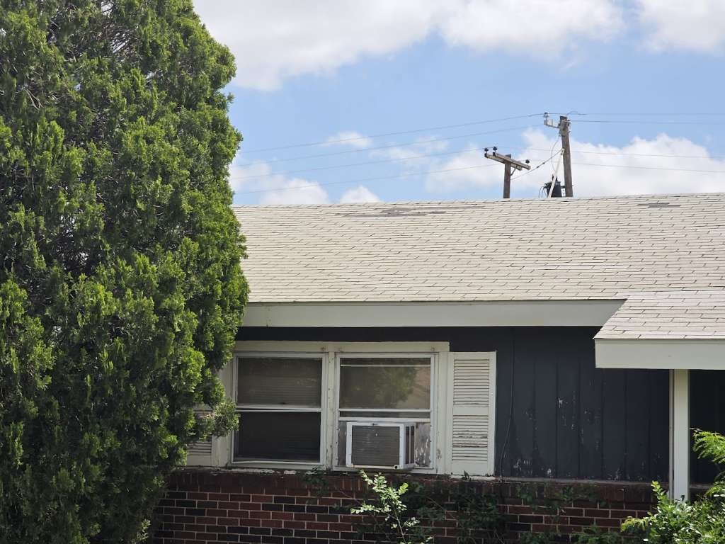 2704 East Colgate Street Lubbock, TX 79403 - Photo 1 of 1 a front view of a house with a yard