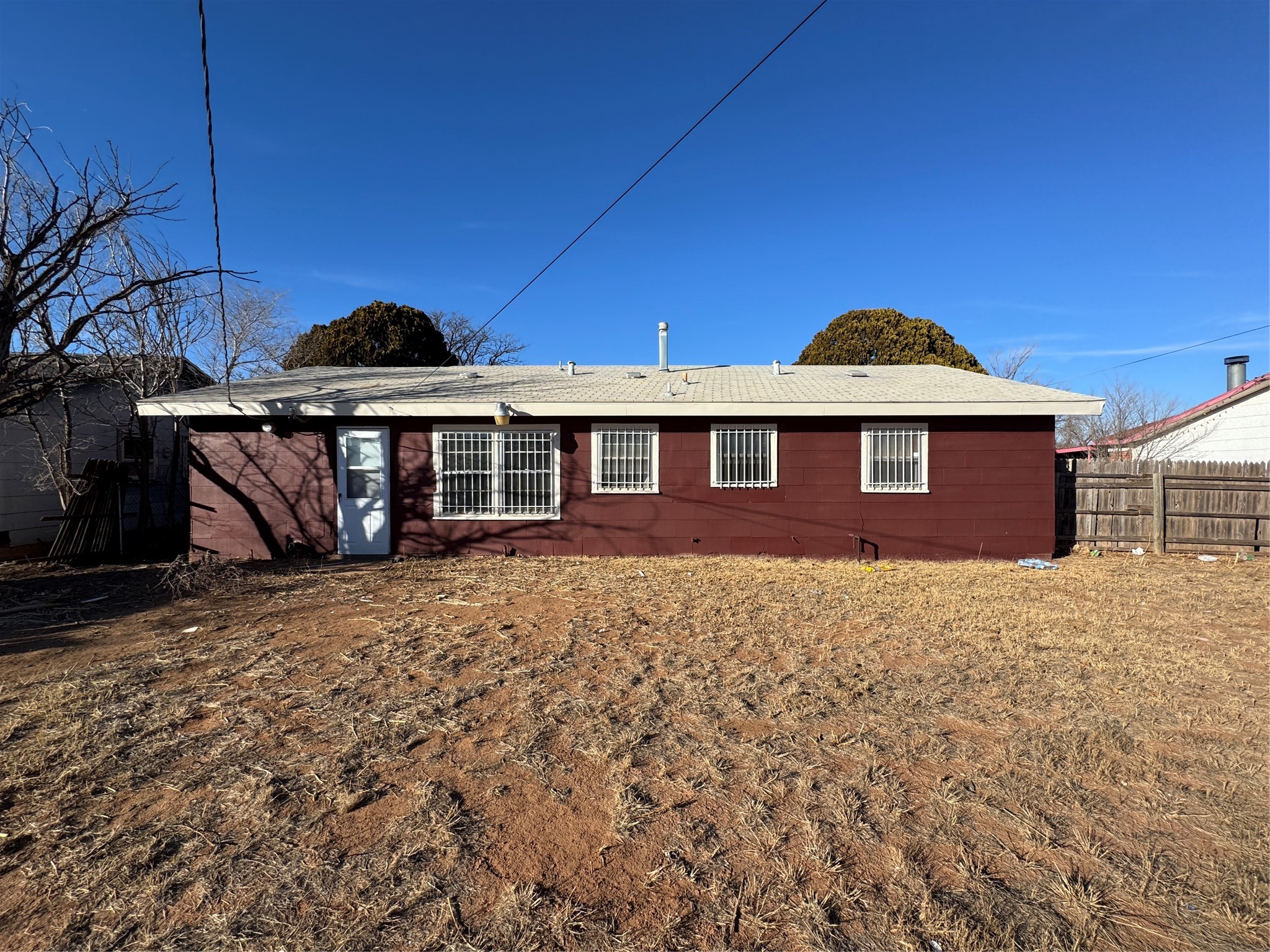 2704 East Colgate Street Lubbock, TX 79403 - Photo 11 of 11 a front view of a house with a yard