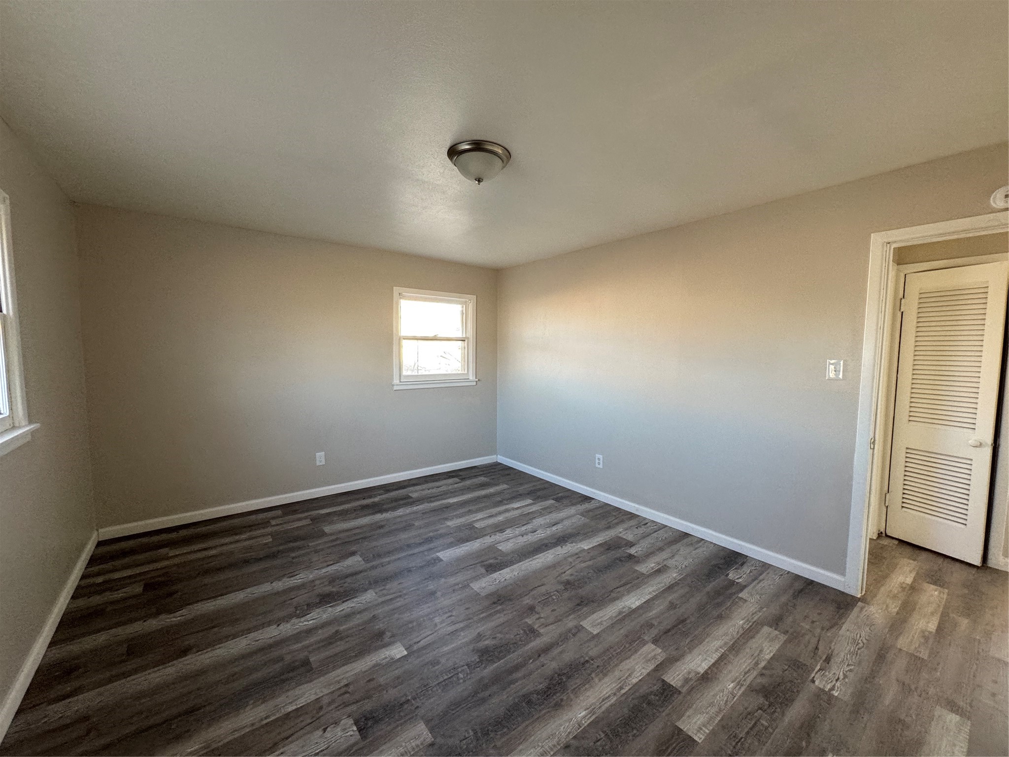 2704 East Colgate Street Lubbock, TX 79403 - Photo 7 of 11 a view of an empty room and window