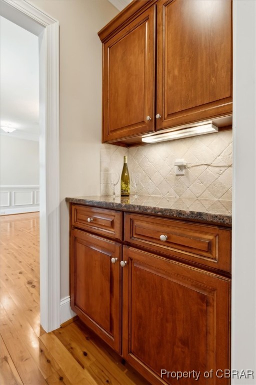 3013 Ridge Drive Toano, VA 23168 - Photo 21 of 50 Bar with backsplash and light wood-type flooring