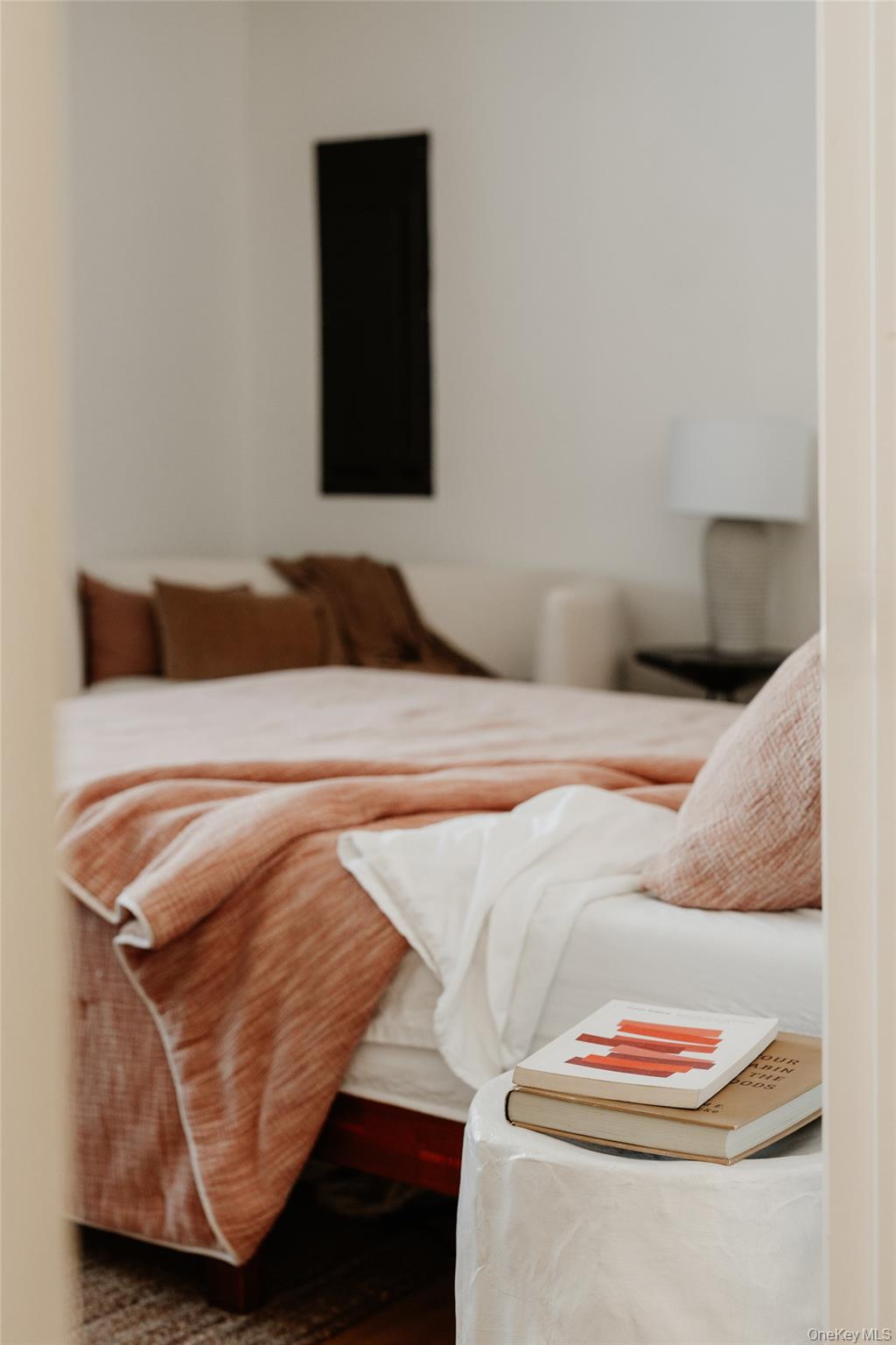 33 4th Street Narrowsburg, NY 12764 - Photo 16 of 26 a bedroom with a bed and a painting on the wall