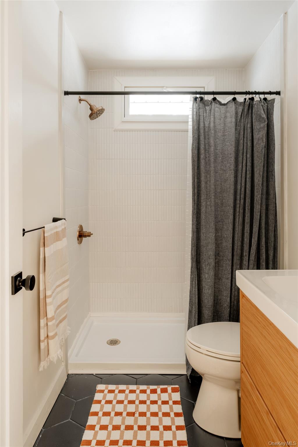 33 4th Street Narrowsburg, NY 12764 - Photo 18 of 26 a bathroom with a toilet and a shower