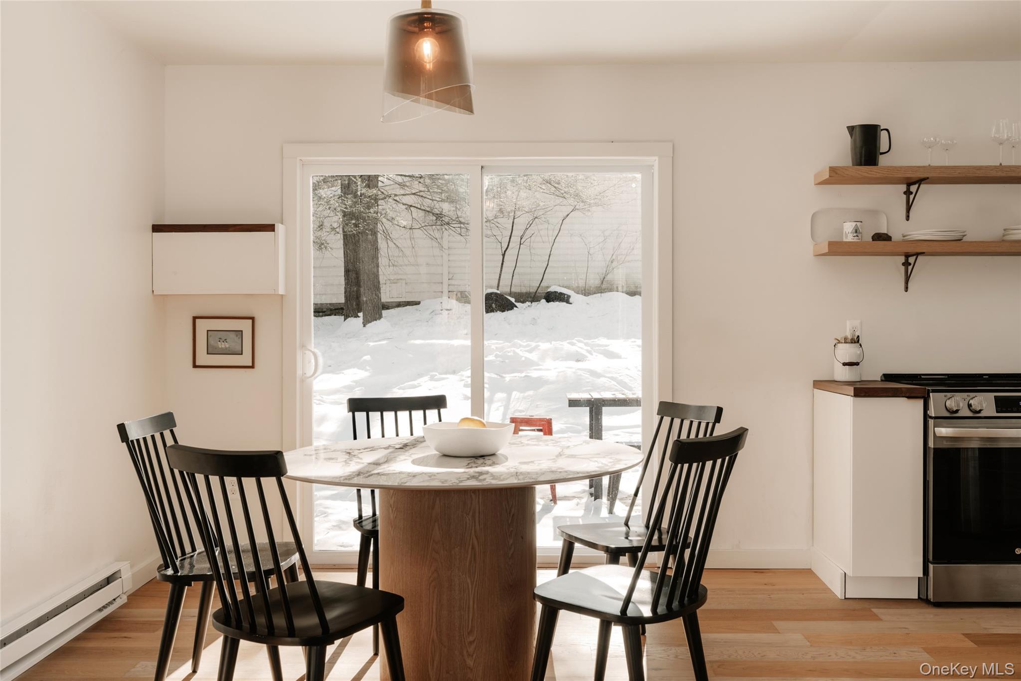 33 4th Street Narrowsburg, NY 12764 - Photo 7 of 26 a view of a dining room with furniture and wooden floor