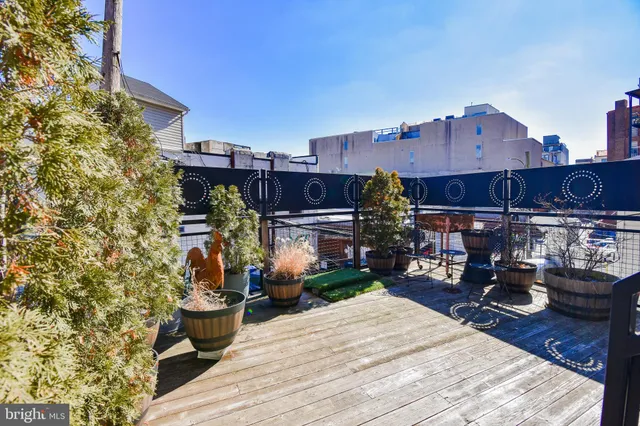 a bed room with a bed and a table