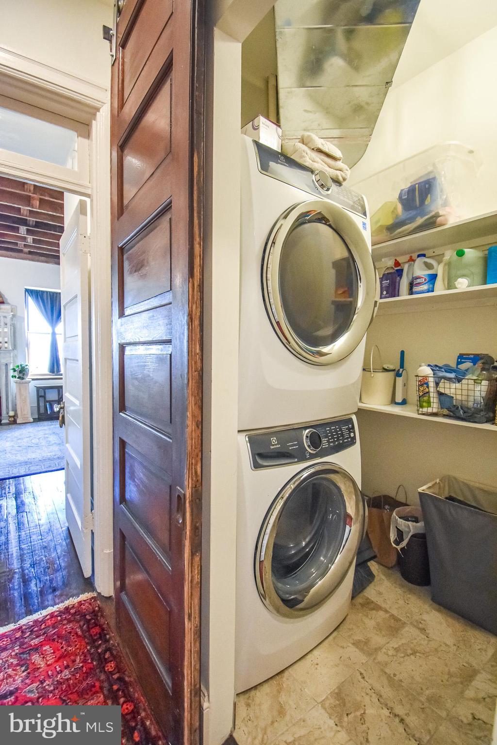 1830 Columbia Road Northwest Washington, DC 20009 - Photo 22 of 46 a utility room with sink dryer and washer