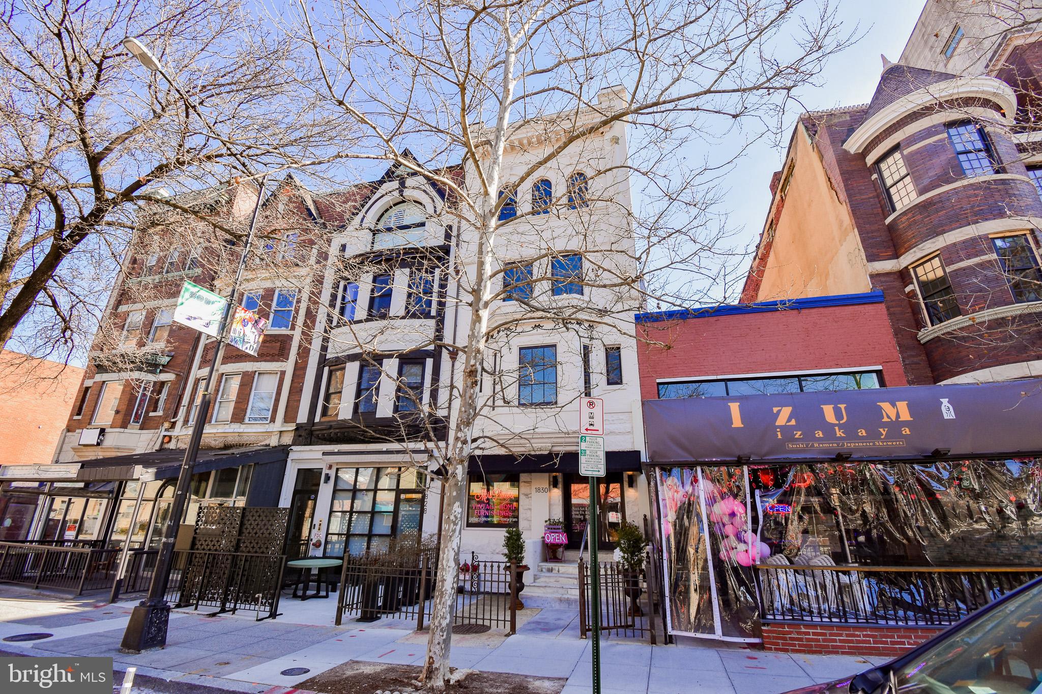 1830 Columbia Road Northwest Washington, DC 20009 - Photo 3 of 46 a view of a brick building with many windows