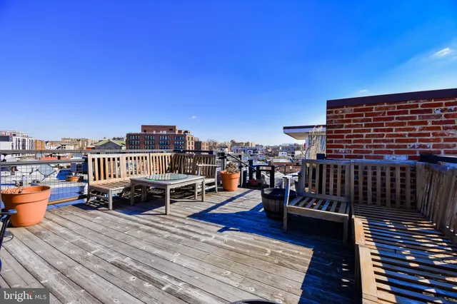 a view of a living room and dining room