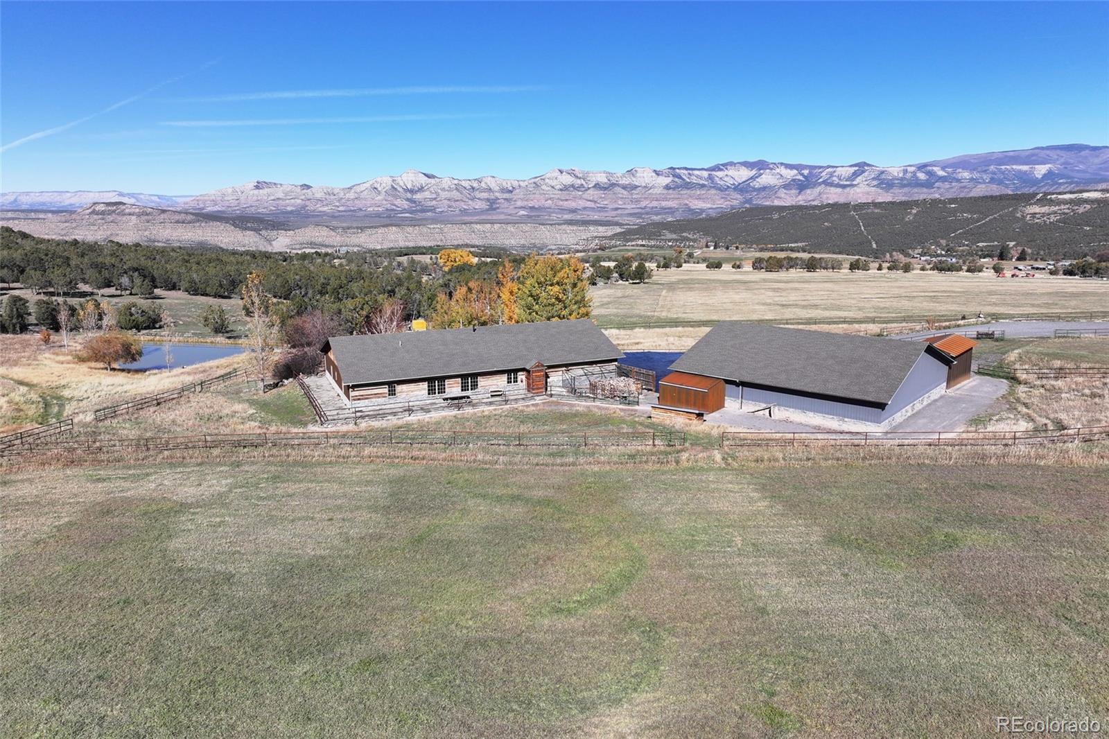10497-54 54 7/10 Road Molina, CO 81646 - Photo 35 of 45 a view of a lake with a mountain