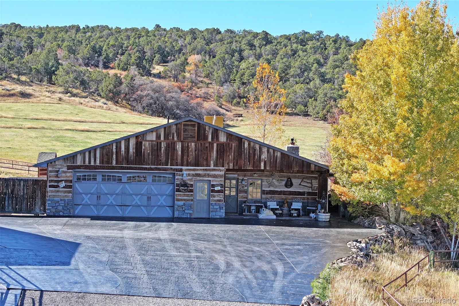 10497-54 54 7/10 Road Molina, CO 81646 - Photo 5 of 45 a view of a house with a yard