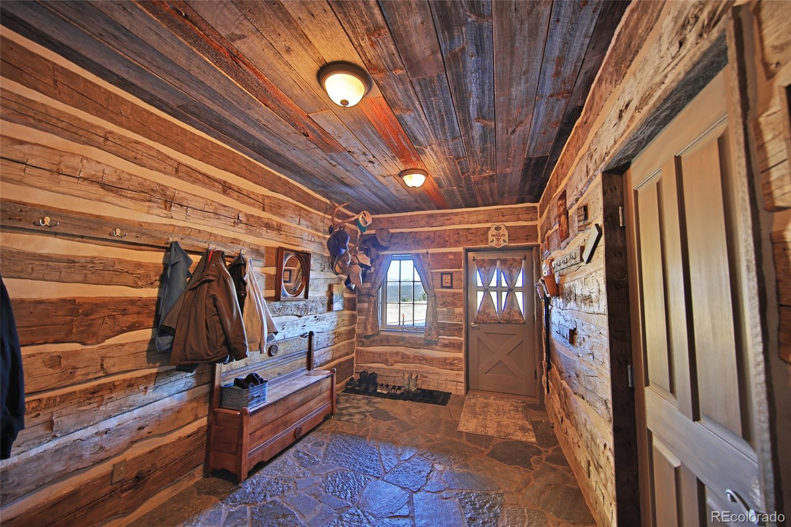 10497-54 54 7/10 Road Molina, CO 81646 - Photo 7 of 45 a view of walk in closet with clothes