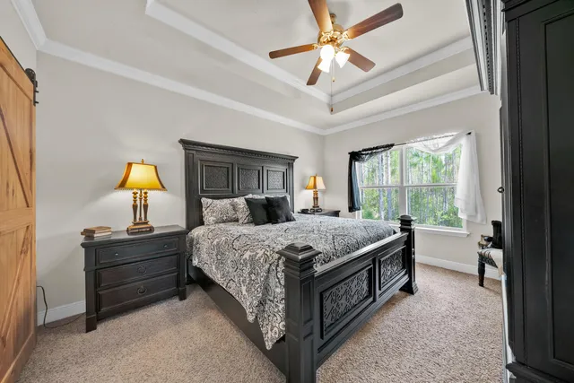a bathroom with a granite countertop sink mirror and shower