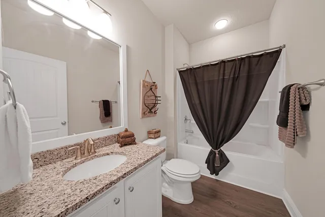 a living room with furniture and window