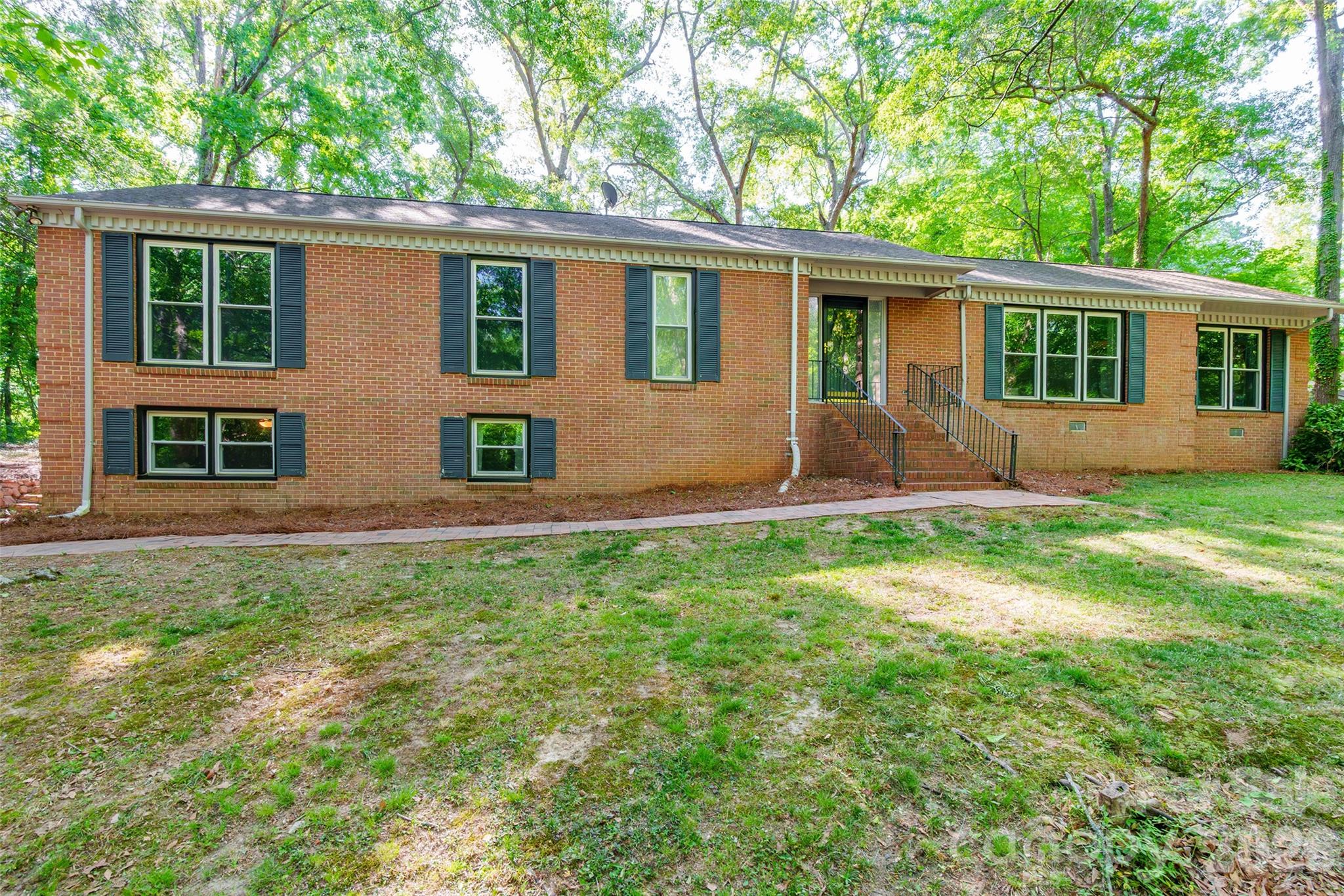 513 Mountainbrook Road Lancaster, SC 29720 - Photo 4 of 48 front view of a house with a yard