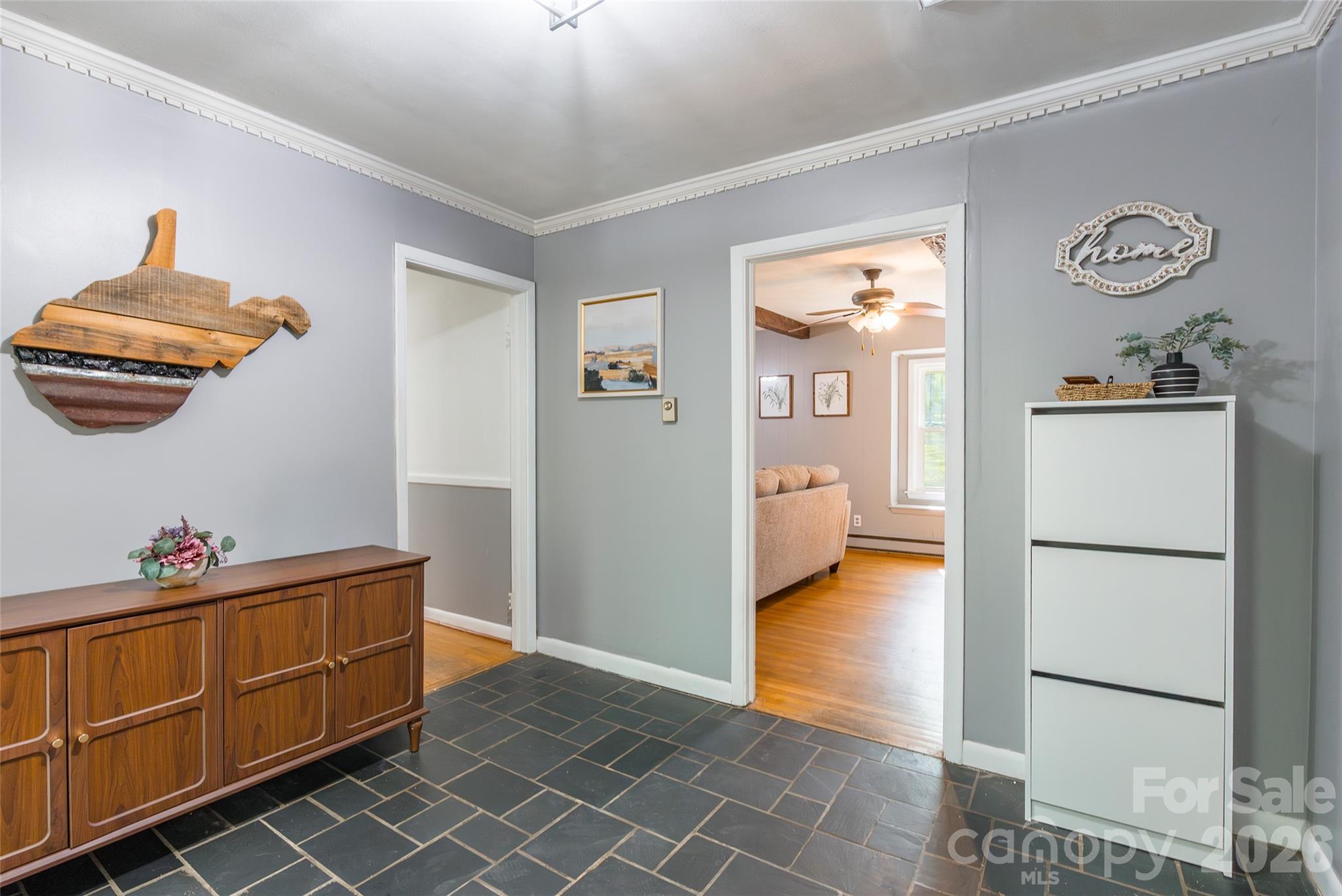 513 Mountainbrook Road Lancaster, SC 29720 - Photo 5 of 48 a hallway with a baby crib and a dresser