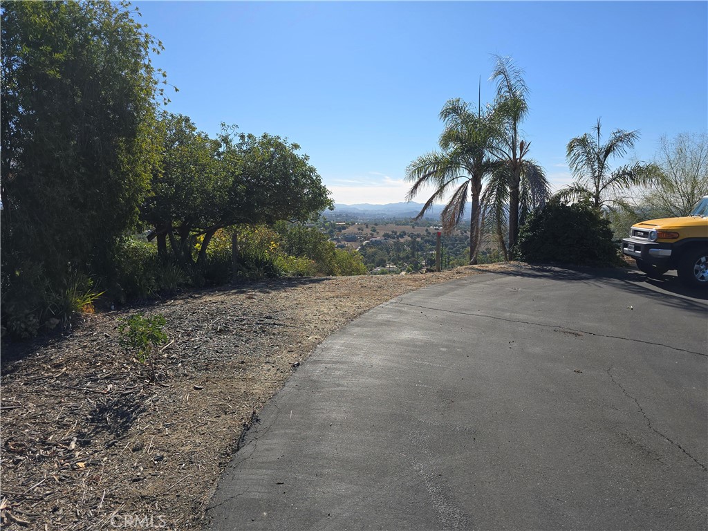 1387 Las Vistas Road Fallbrook, CA 92028 - Photo 6 of 26 a view of a dirt road and a building