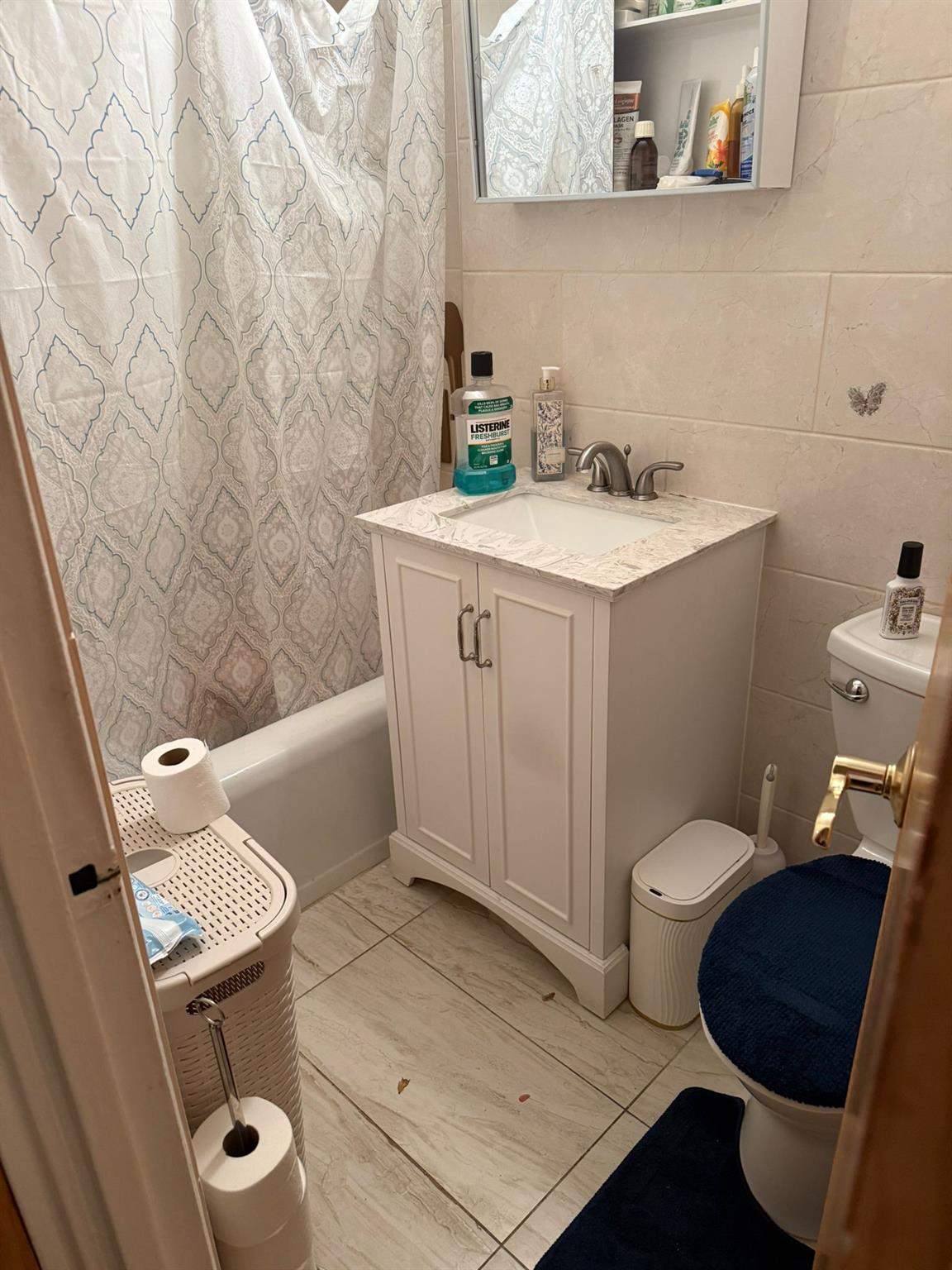97-37 63rd Road, Unit 5N Queens, NY 11374 - Photo 14 of 17 Full bathroom with vanity and shower / bath combo