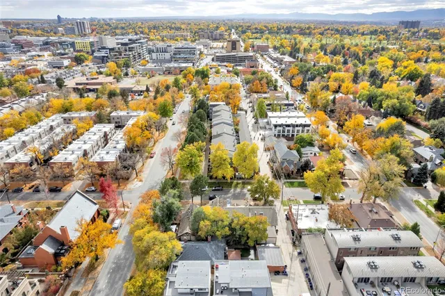 an aerial view of residential building and parking space