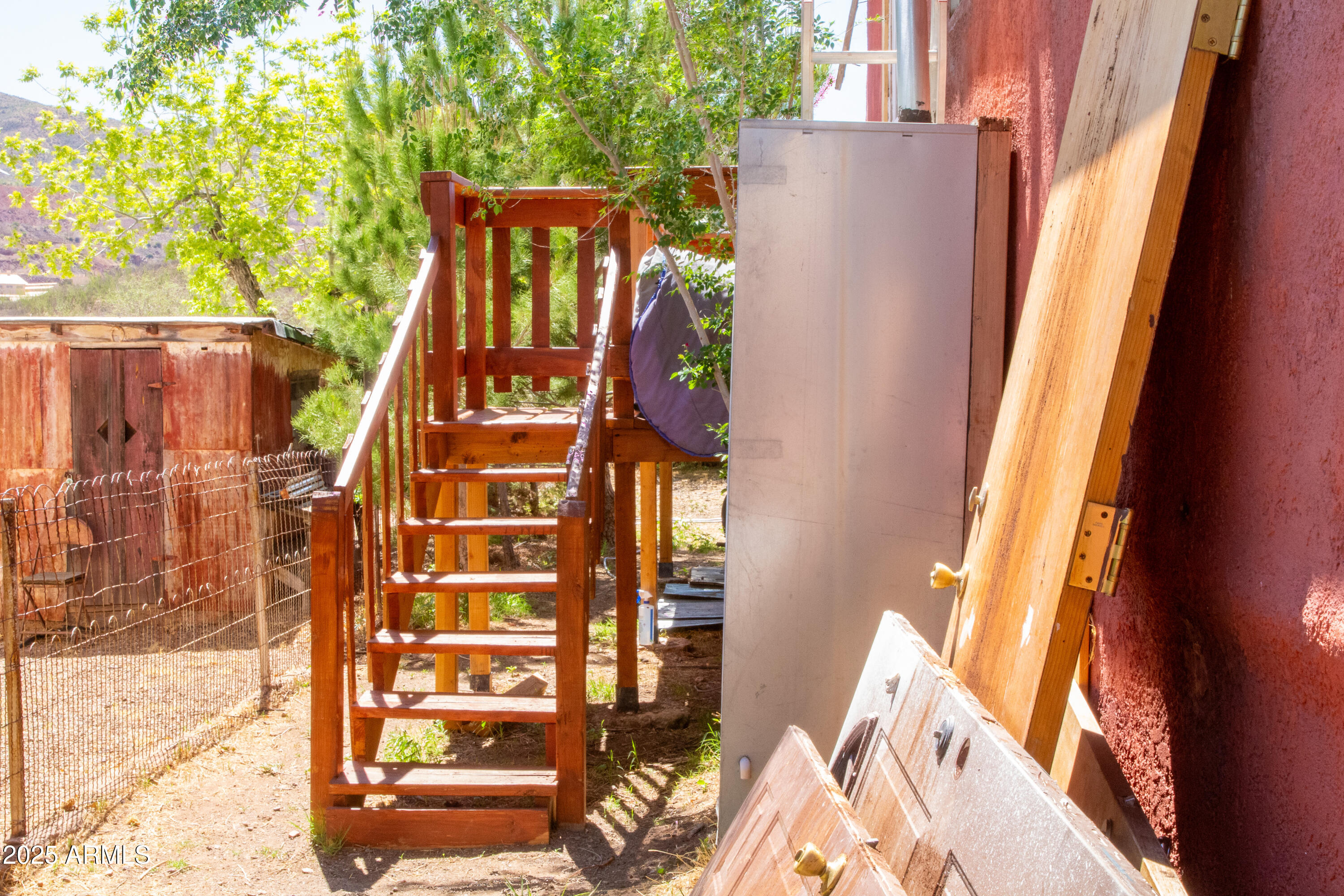 209 A Street Bisbee, AZ 85603 - Photo 19 of 23 a view of balcony with a door and wooden floor