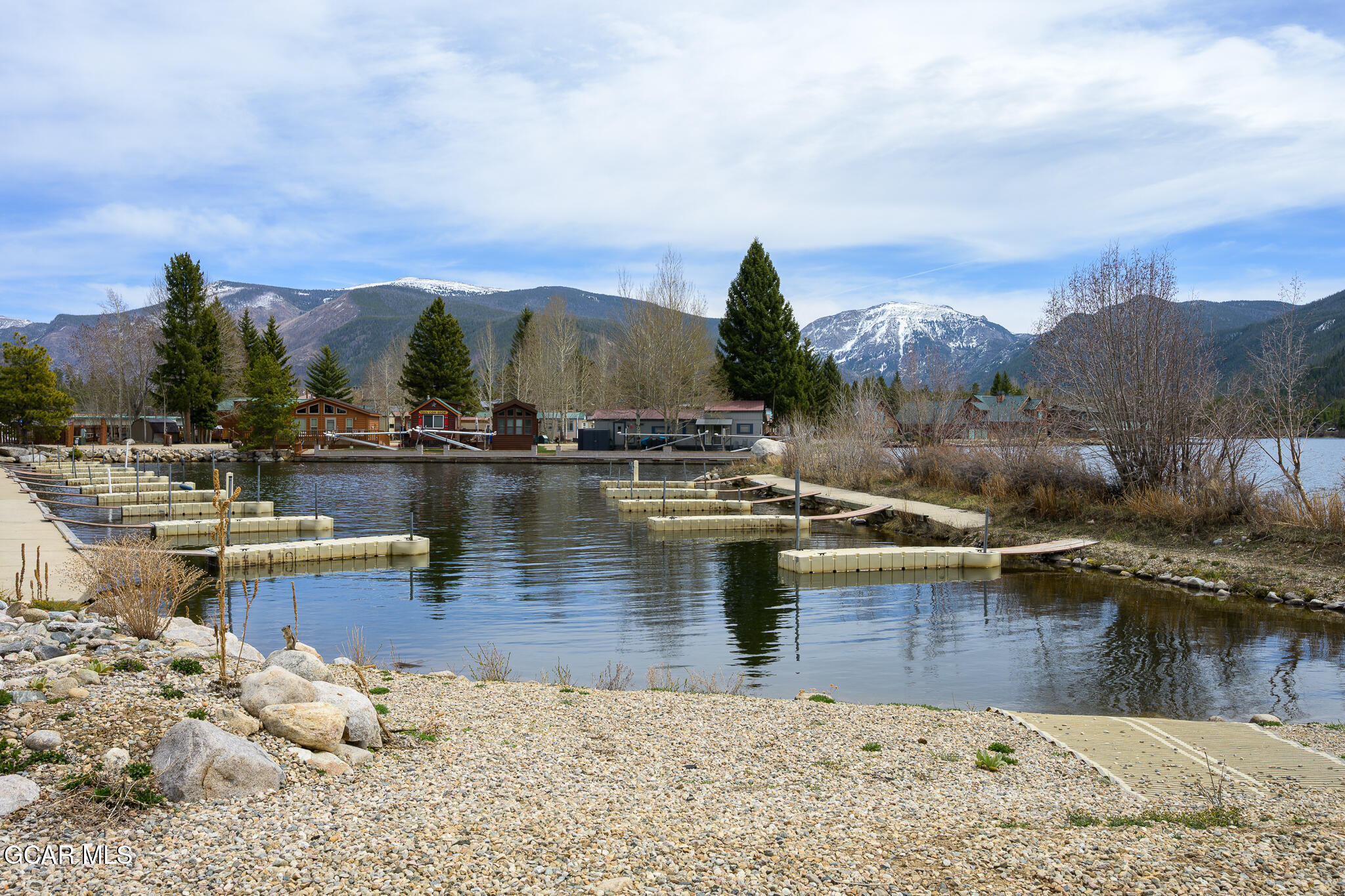 605 Lake Front Road, Unit W8 Grand Lake, CO 80447 - Photo 5 of 28 a view of a lake with houses