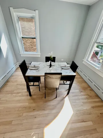 a view of a workspace with furniture